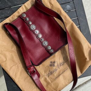 Patricia Nash Oxblood Leather Crossbody with Concho Accents